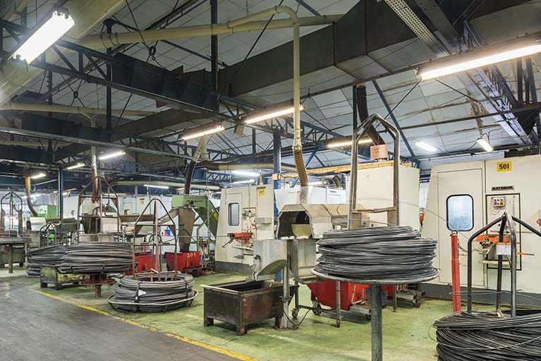 Atelier de fabrication (début 20e siècle) et sa charpente métallique.