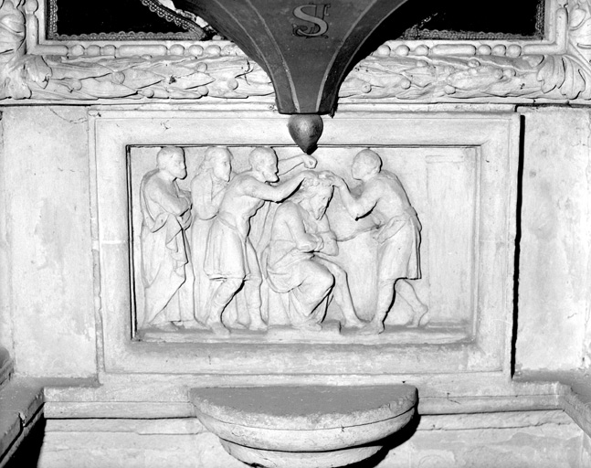 Relief de la Dérision, dans l'aile droite du retable.