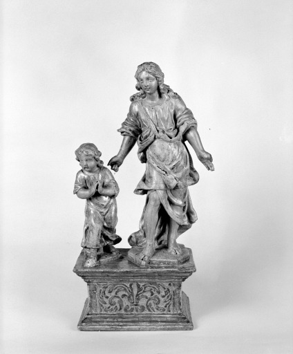 Ensemble de 2 groupes sculptés : ange gardien et enfant, saint Joseph et l'Enfant Jésus