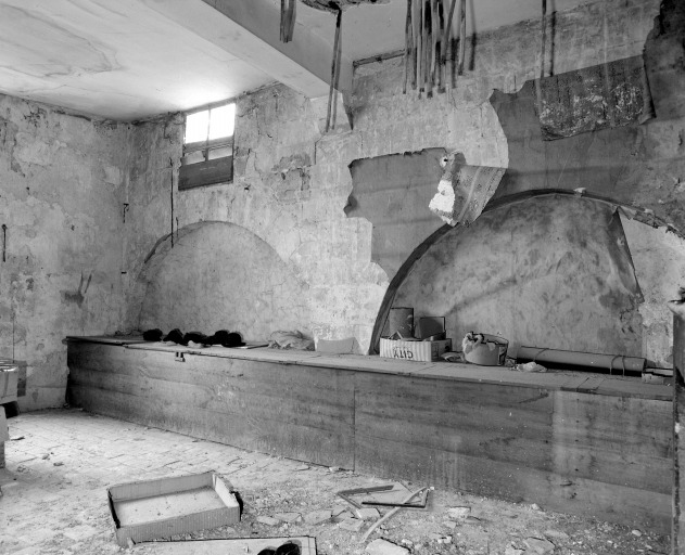 Arcades aveugles dans le mur oriental de la pièce à l'étage carré, au 6 rue du Marché-au-Blé.