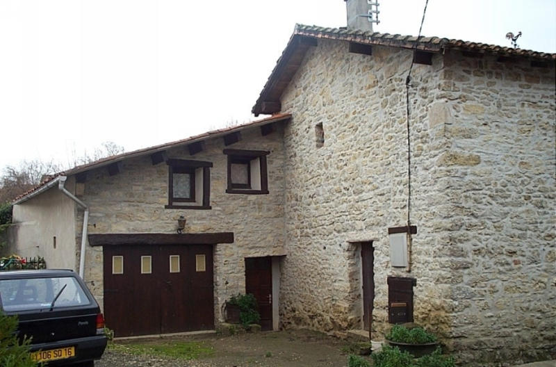 Elévation postérieure du logement et façade de l'ancienne grange