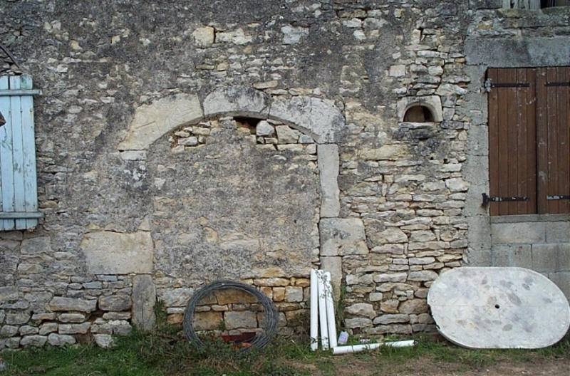 Ouverture chanfreinée murée
