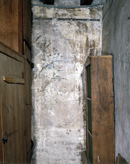 Vestige d'un décor peint au sommet de la cage d'escalier