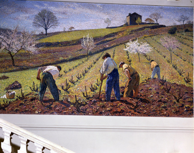 Mur sud : le sarclage de la vigne.