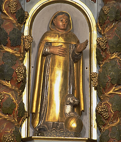 Saint Dominique sur l'aile droite du retable.