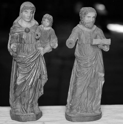 Statuettes du tabernacle : Vierge à l'Enfant et saint tenant un livre. Face.