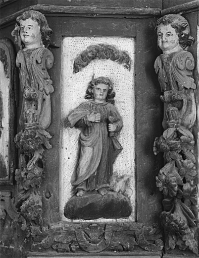 Panneau latéral sud de l'armoire eucharistique : saint Jean l'Evangéliste.