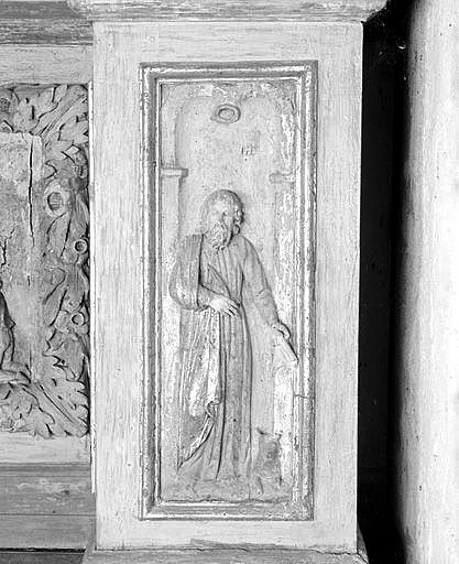 Retable, détail d'un relief : saint Luc l'Evangéliste.