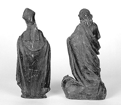 Statuettes des niches du tabernacle vues de revers : saint Martin de Tours en évêque, et saint Jean Baptiste accompagné de l'agneau.