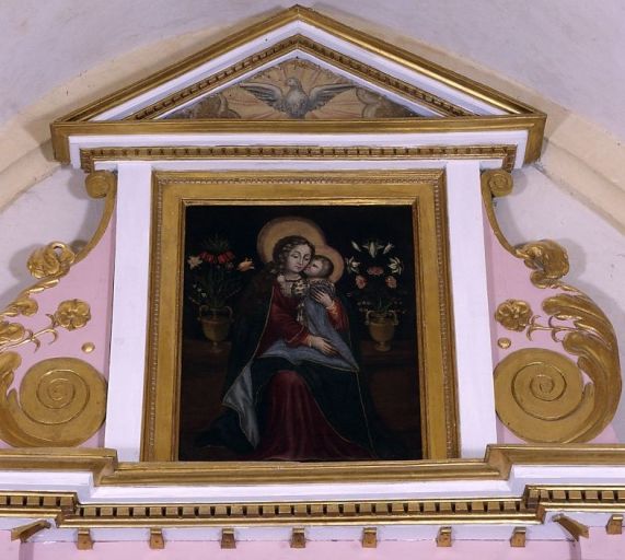 Fronton du retable : tableau de la Vierge à l'enfant.