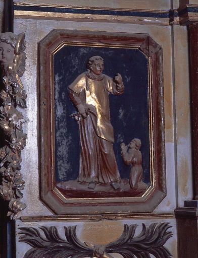 Détail du panneau de l'aile gauche du retable : saint Léonard et un prisonnier.
