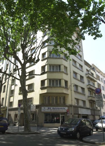 24 cours Bayard, immeuble à angle à pans coupés en encorbellement