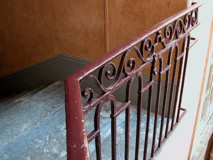 Escalier, détail du garde-corps d'un repos.