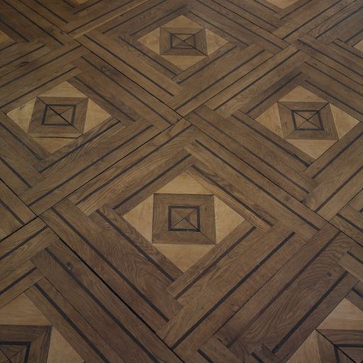 Ancien appartement du curé, grand salon, détail du parquet en marqueterie composé de 3 essences de bois différentes.