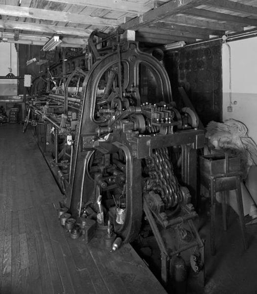 Métier à tisser de marque Johnson, détail latéral, chaîne d'entraînement