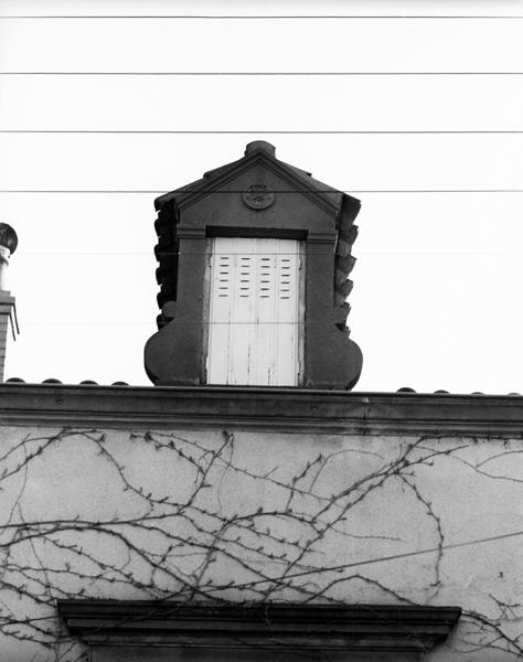 Détail d'une lucarne (Maringues, ville)