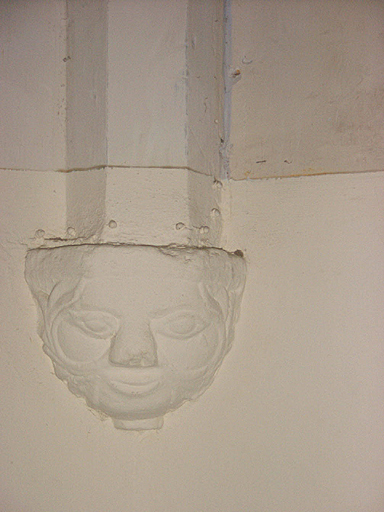 Détail d'un culot orné d'un masque.