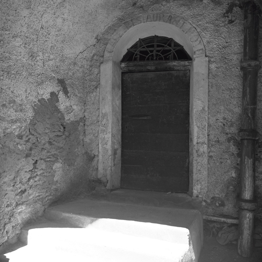 Fontchristianne. Parcelle 630. Façade sud. Porte d'entrée. Imposte en fer forgé portant l'inscription 1 7 I C 4 . .