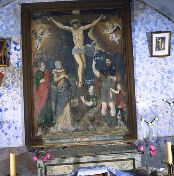 Christ en croix entouré par la Vierge, saint Jean, saint Roch et sainte Madeleine. Tableau non signé, daté de1662.