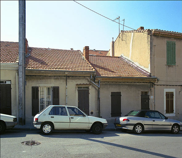 Ilot compris entre le boulevard Farrenc et le littoral. Deux maisons jumelées d'un ensemble de trois, 10 boulevard Farrenc (K0144 et 145), construites en 1906 pour Lucien Carle, chauffeur, et identifiées dans les matrices cadastrales comme cabanons et lavoirs.