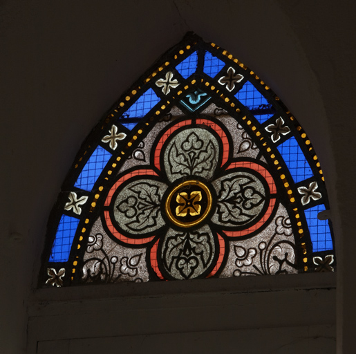 Verrière d'une baie de la façade à l'est.