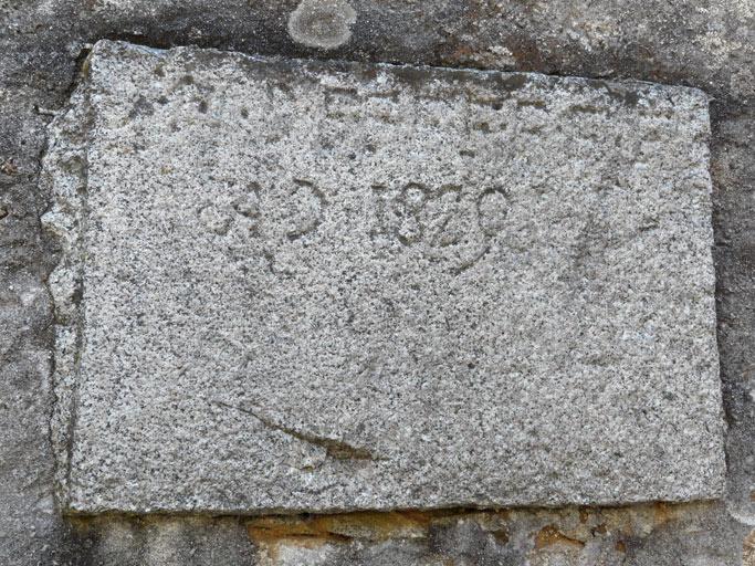 Date portée figurant sur l'élévation antérieure.