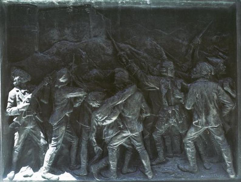 Vue d'ensemble du bas-relief figuré sur l'élévation latérale droite du monument, figurant le général Gaffori au milieu des Cortenais armés, les commandant dans la défense de la citadelle de Corte.