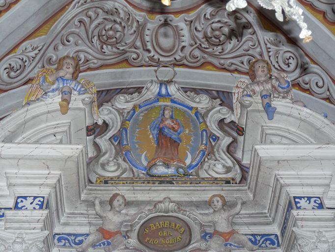 Représentation de l'Immaculée Conception, ornant le retable.