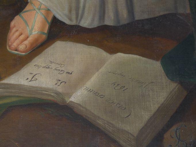 Vue d'ensemble de l'inscription peinte sur le livre, aux pieds de sainte Dévote.