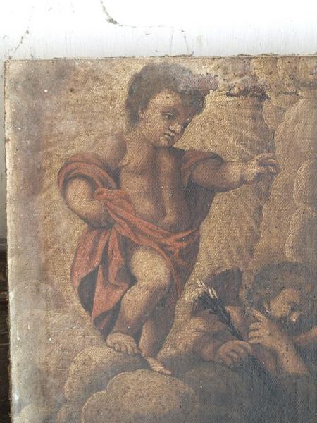 Enfant Jésus figurant dans le registre supérieur de la toile.