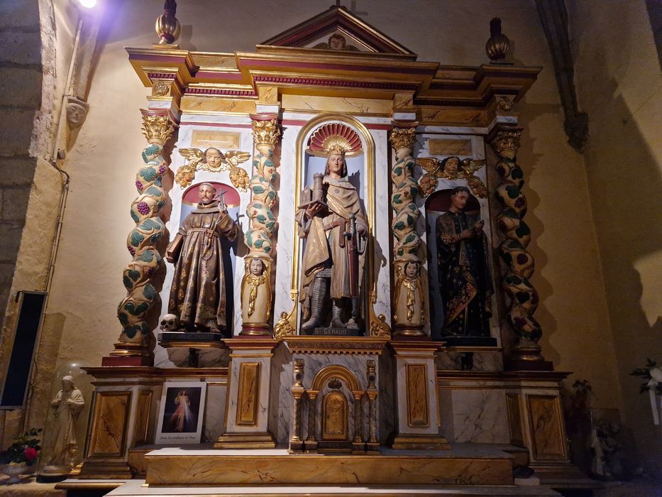retable d'une chapelle latérale, statues : Saint Géraud, saint François d'Assise, saint Louis de Gonzague