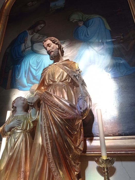 groupe sculpté : Saint Joseph et Jésus, vue partielle