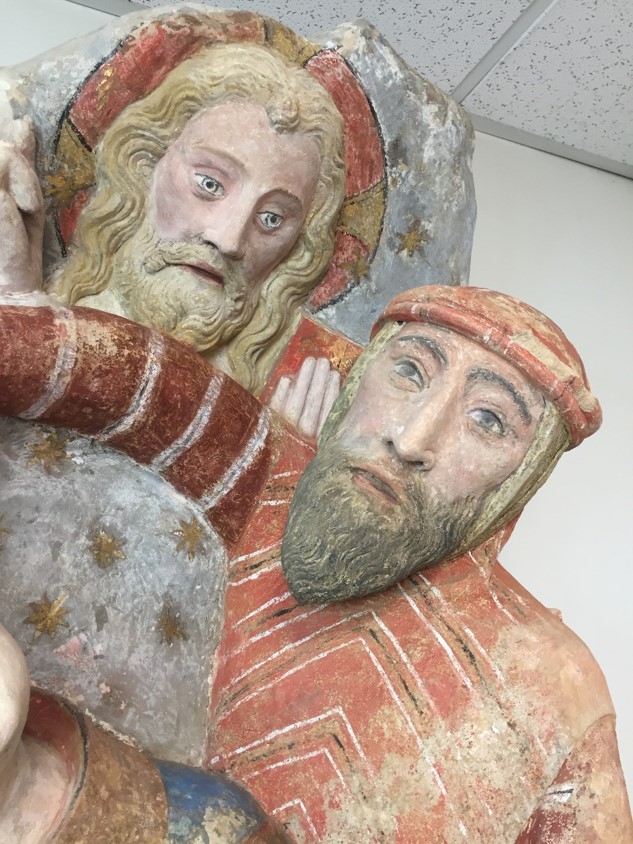 groupe sculpté : La Lapidation de saint Étienne, têtes de Dieu le père et du bourreau