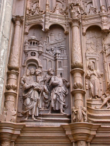 Détail du vantail de gauche en cours de restauration (essais de teinte et patine par l'atelier Lehuen, 2002) : saint Pierre guérit un boiteux à la porte du Temple de Jérusalem.