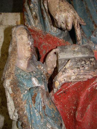 groupe sculpté : Sainte Anne et la Vierge ou l'éducation de la Vierge, détail du groupe en cours de restauration : la Vierge tenant le livre (atelier Giordani, 2004)