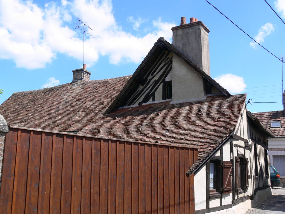 Groupe d'habitations en pans de bois : Façade postérieure, vue partielle