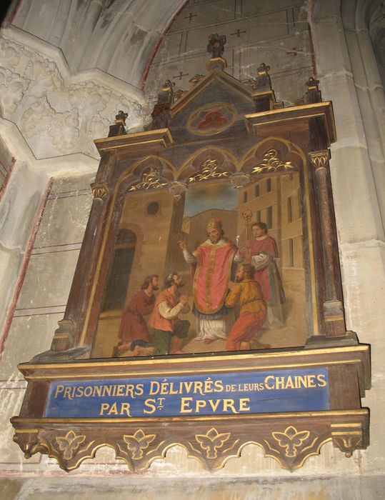 tableau de la vie de saint Epvre, cadre : Les prisonniers délivrés de leurs chaînes par saint Epvre