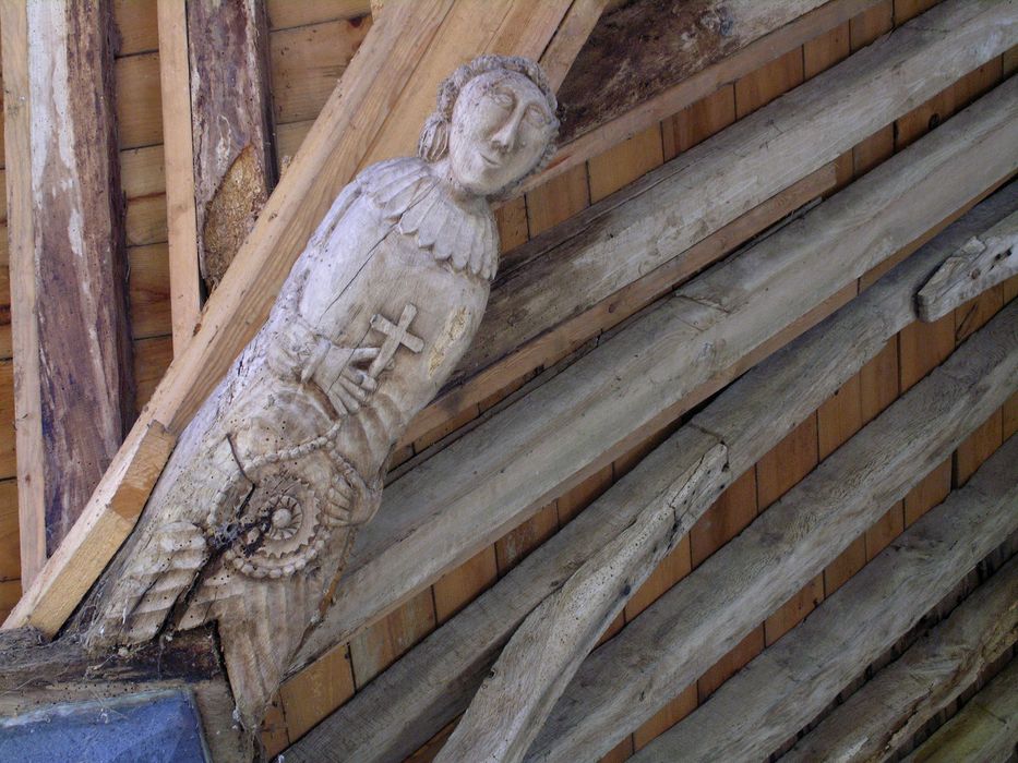 Chapelle Saint-Aubin : Charpente, détail d'un des douze blochets représentant les apôtres