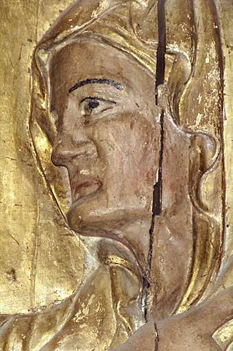 retable du maître-autel. Détail de la Visitation : visage de sainte Elisabeth, avant restauration (atelier Lacoste, novembre 2000 - février 2001).