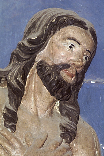 retable du maître-autel. Détail du Baptême du Christ : tête du Christ, avant restauration (atelier Lacoste, novembre 2000 - février 2001).