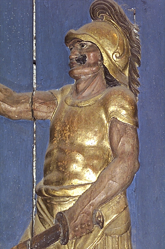 retable du maître-autel. Détail de la Décollation de saint Jean Baptiste : soldat, avant restauration (atelier Lacoste, novembre 2000 - février 2001).