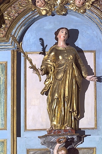 Statue de sainte Eulalie, au centre du retable. - © Inventaire général, ADAGP  ; © Monuments historiques, 2000