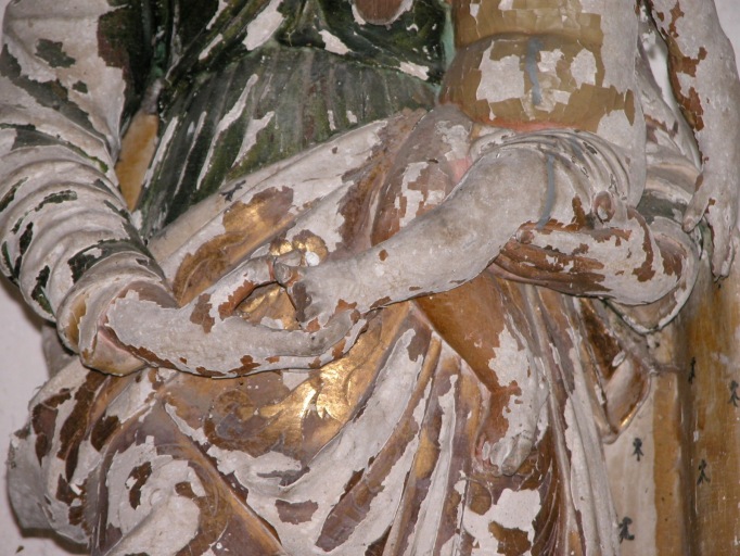Détail des mains de la Vierge et de la jambe de l'enfant Jésus.