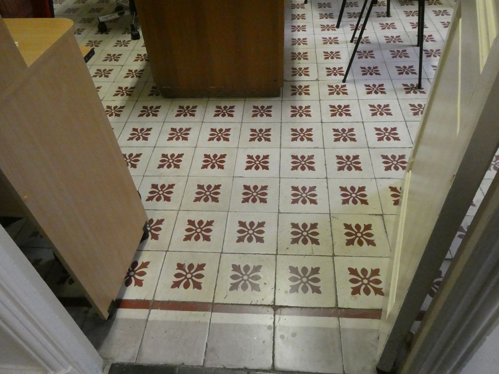 Logement. Détail des carreaux de ciment.