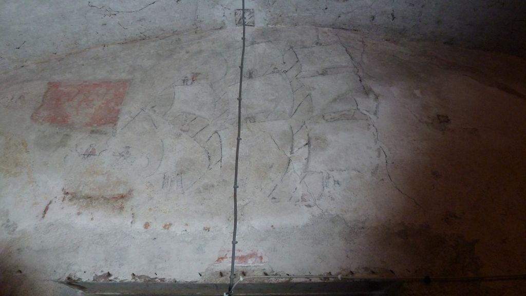 RDC. Probable ancienne salle de culte protestant. Décor avec drapeau aux 3 fleurs de lys et phrase en grec.