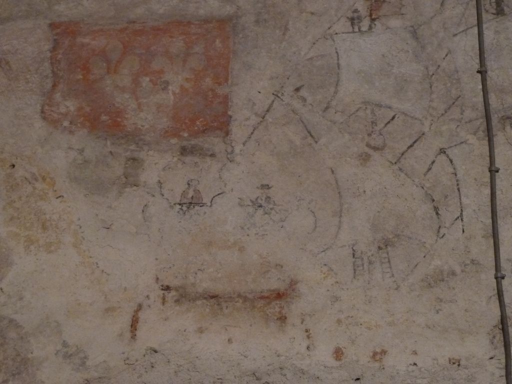 RDC. Probable ancienne salle de culte protestant. Décor avec drapeau aux 3 fleurs de lys et phrase en grec.