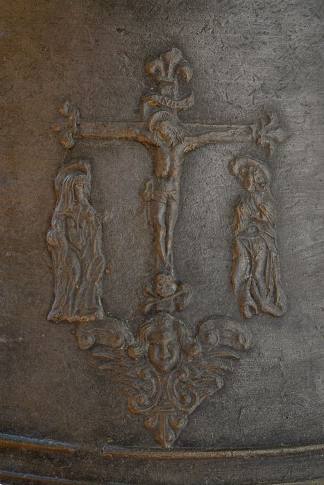 Cloche : cartouche de la Crucifixion