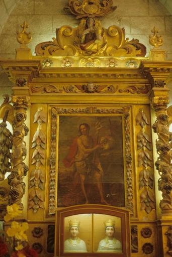 Retable de saint Jean-Baptiste et sa toile. Toile centrale représentant le saint.