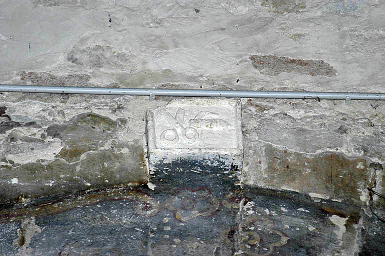 Cinquième chapelle nord, armoiries de la confrérie des marchands de toiles.