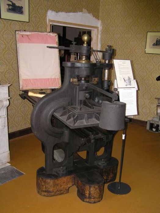 Machine à imprimer à encre liquide (presse à barreau)